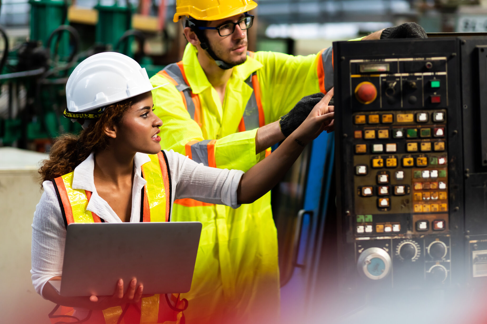 No Code CRM for Manufacturing | a man and woman in safety vests and hardhats